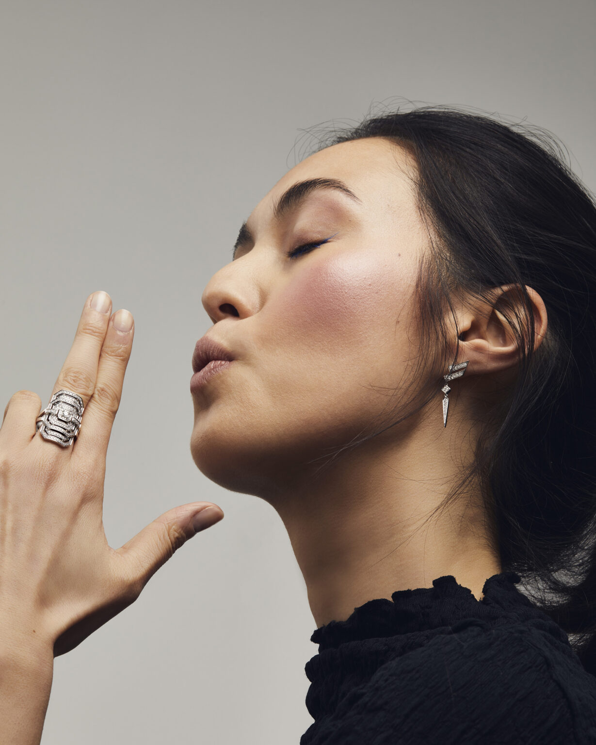 statement ring and earring-on model