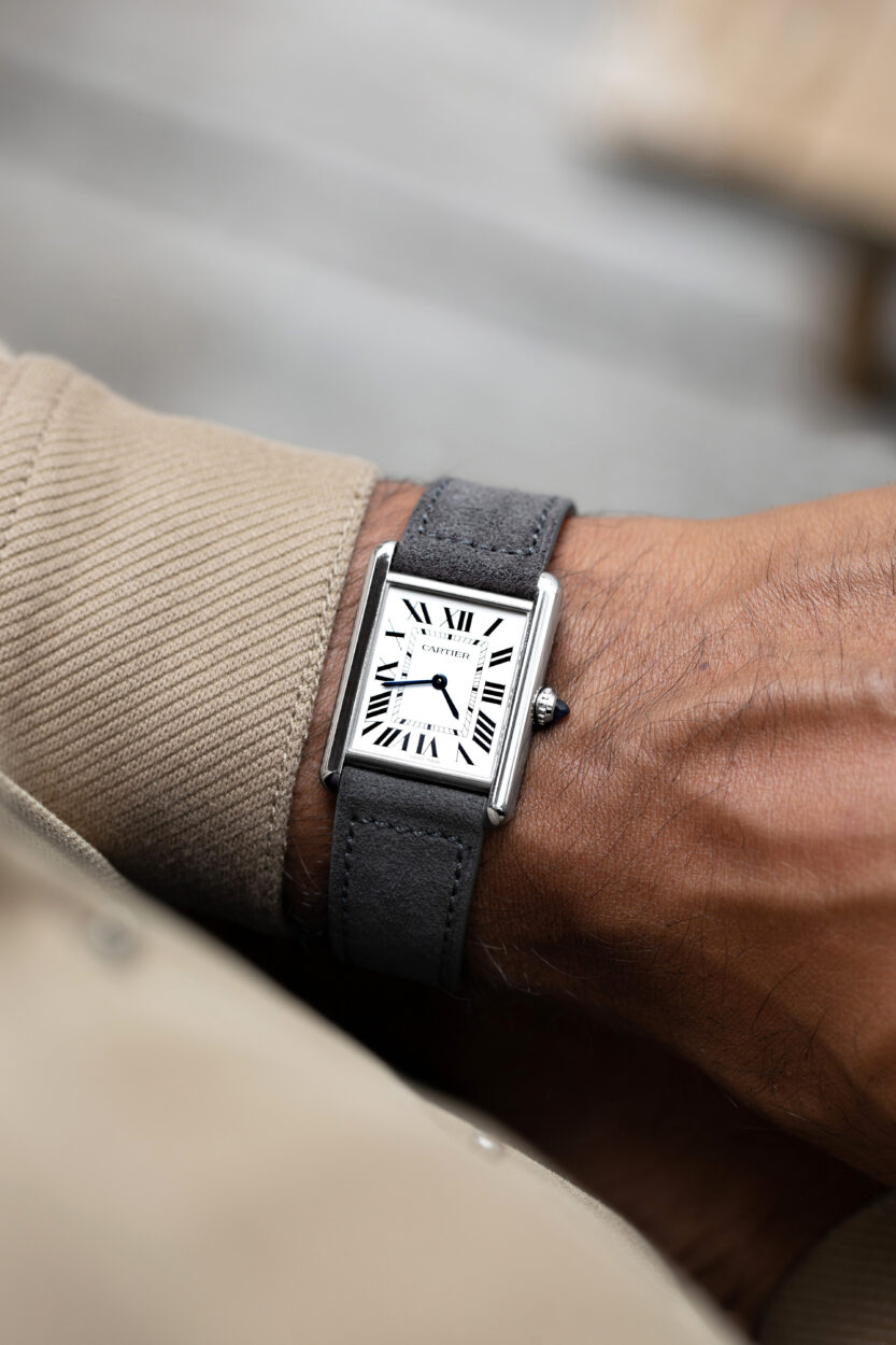 Suede Grey Molequin Strap on a Cartier Must white dial